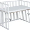 Amal II Piccolo Wit Babywieg Aan Bed Incl. Matras 1 Amal II Piccolo Wit Babywieg Aan Bed Incl. Matras -Goedkope Babywinkel piccolo wit beuken hout baby wieg aan bed